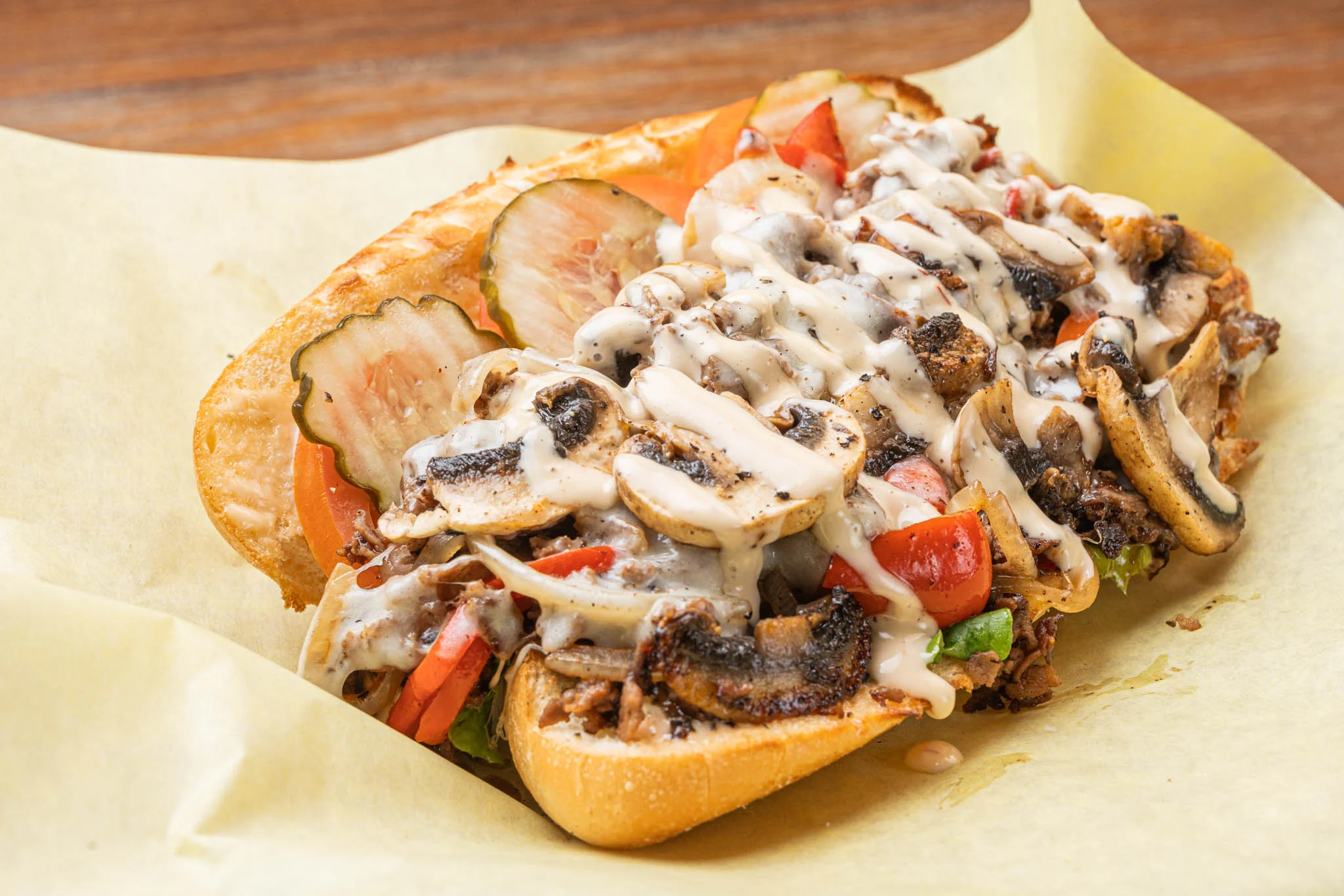 Mushroom Deluxe Cheesesteak with melted cheese and fresh toppings