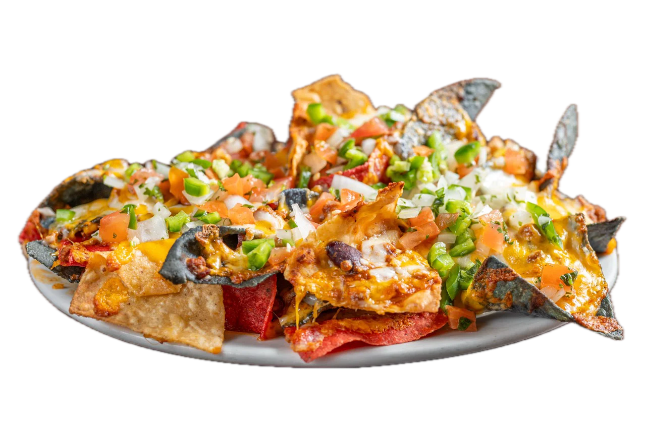 Loaded nachos topped with cheese and fresh toppings