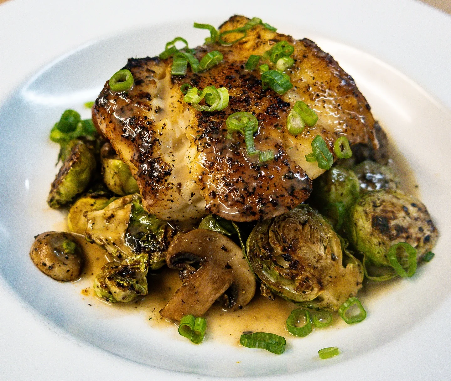 Pan-seared fish with Brussels sprouts and mushrooms