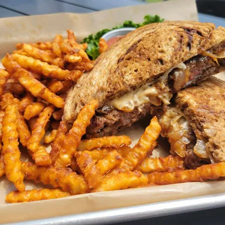 Grilled cheese sandwich with fries