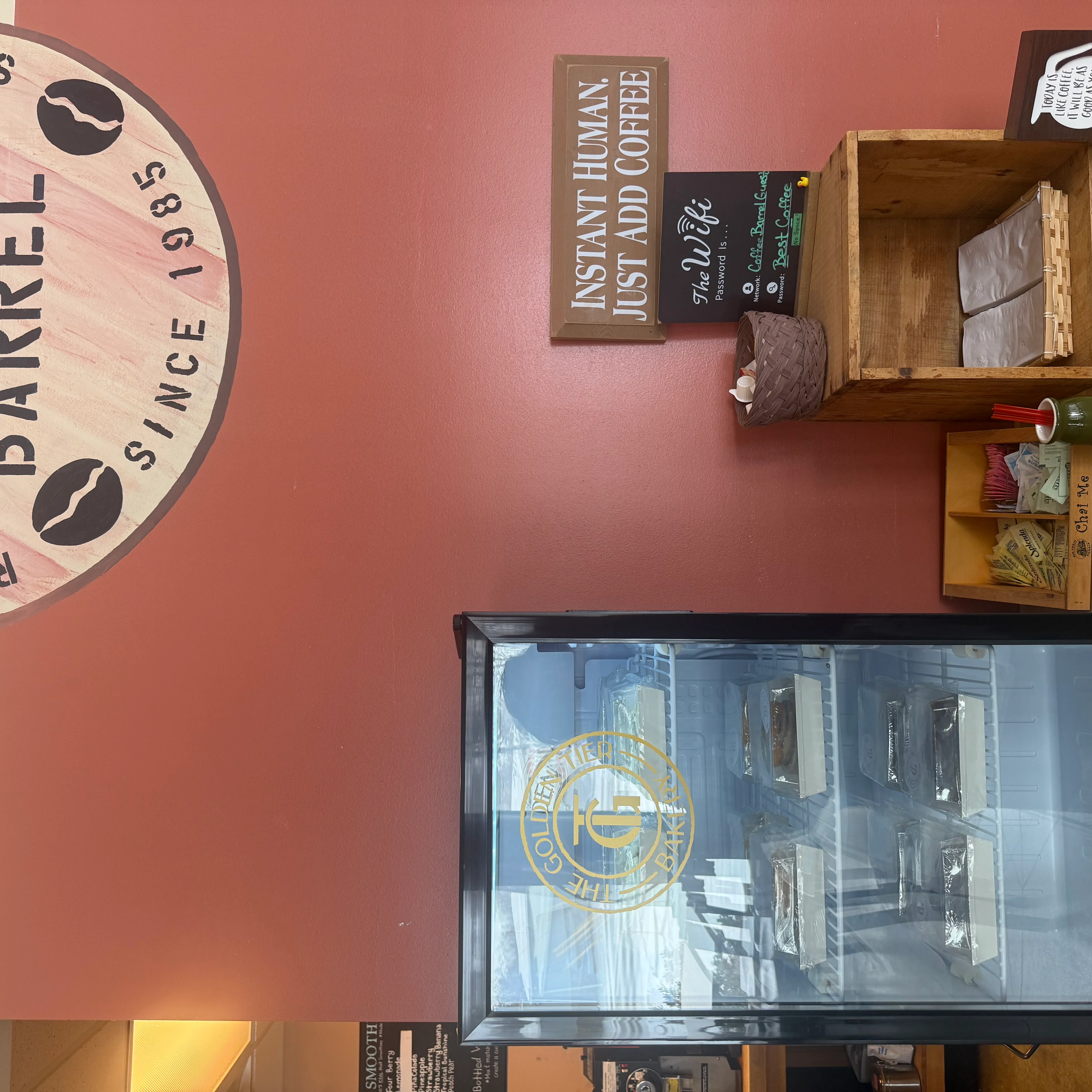 Cozy coffee shop interior with baked goods display