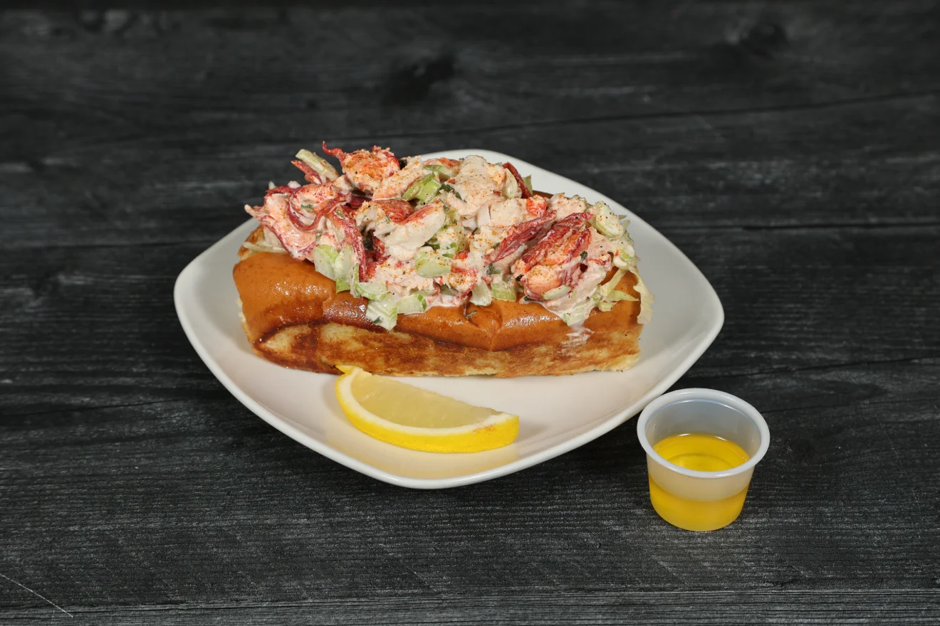 Delicious lobster roll served on a toasted bun with fresh ingredients.