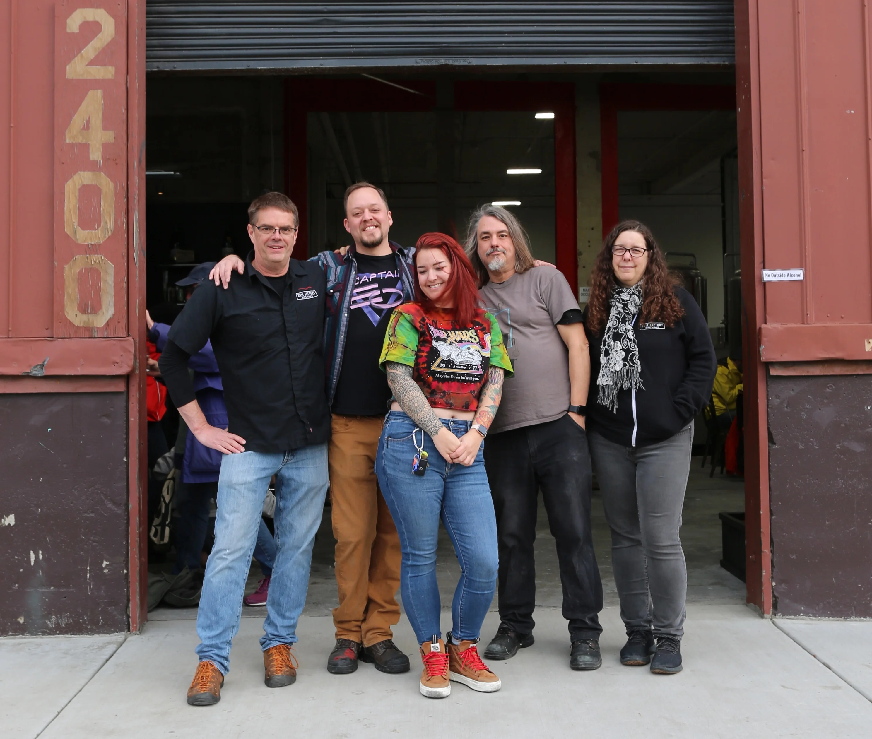 Brewery employees standing together