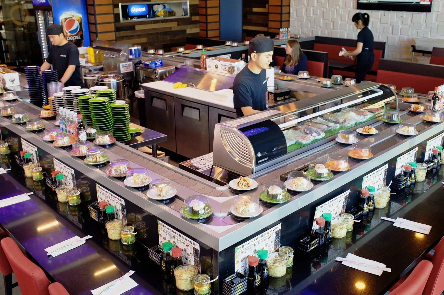 Sushi conveyor belt in a modern Japanese restaurant