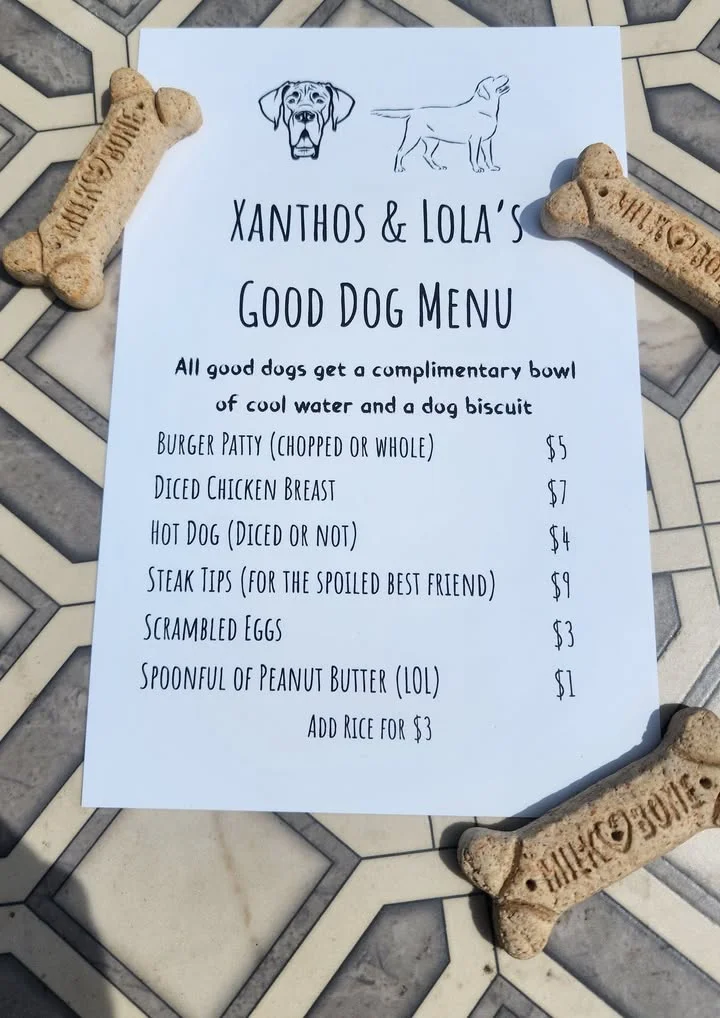 Dog-friendly menu featuring treats for pets at a restaurant