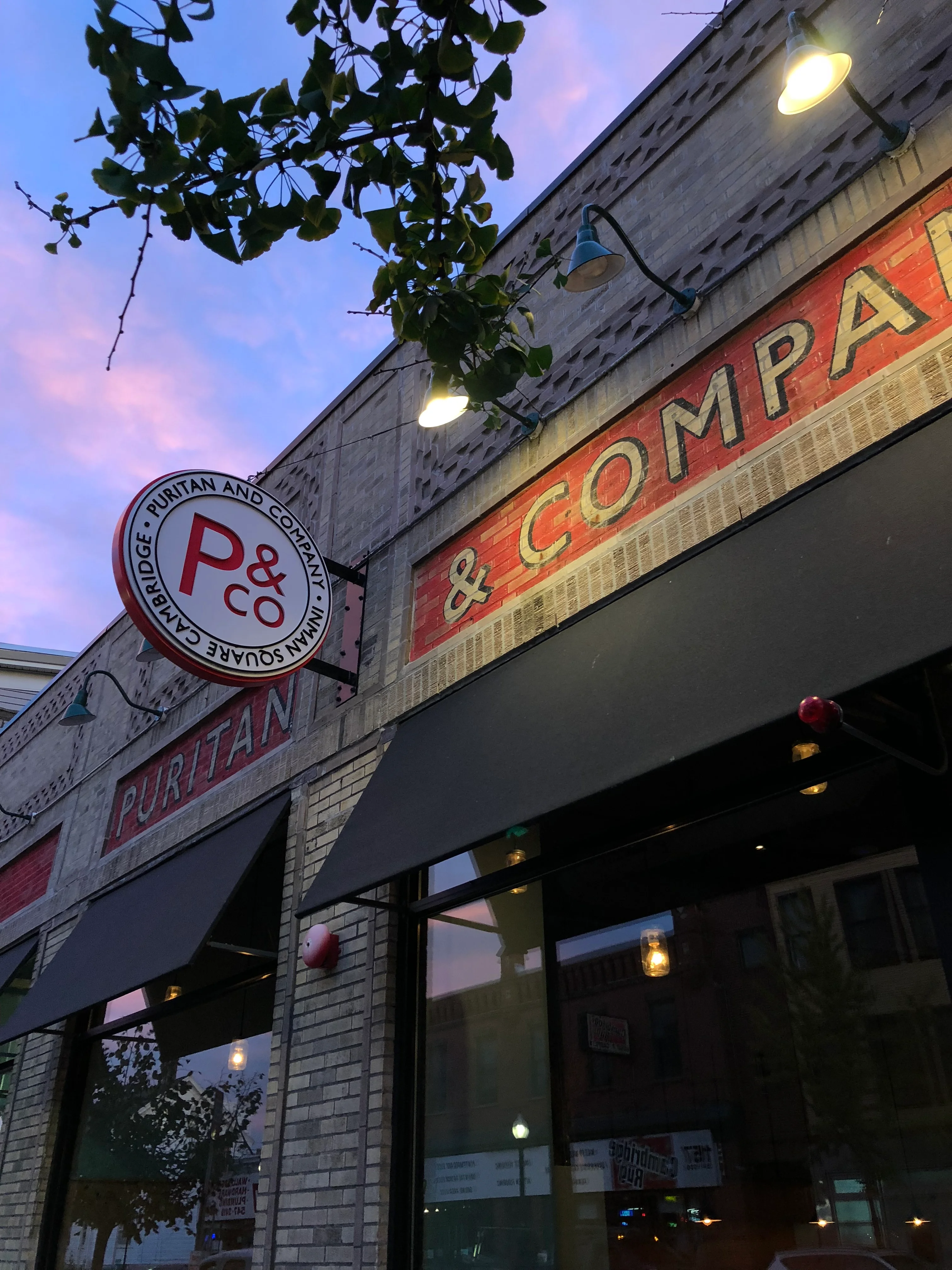 Exterior view of Puritan & Company restaurant at dusk