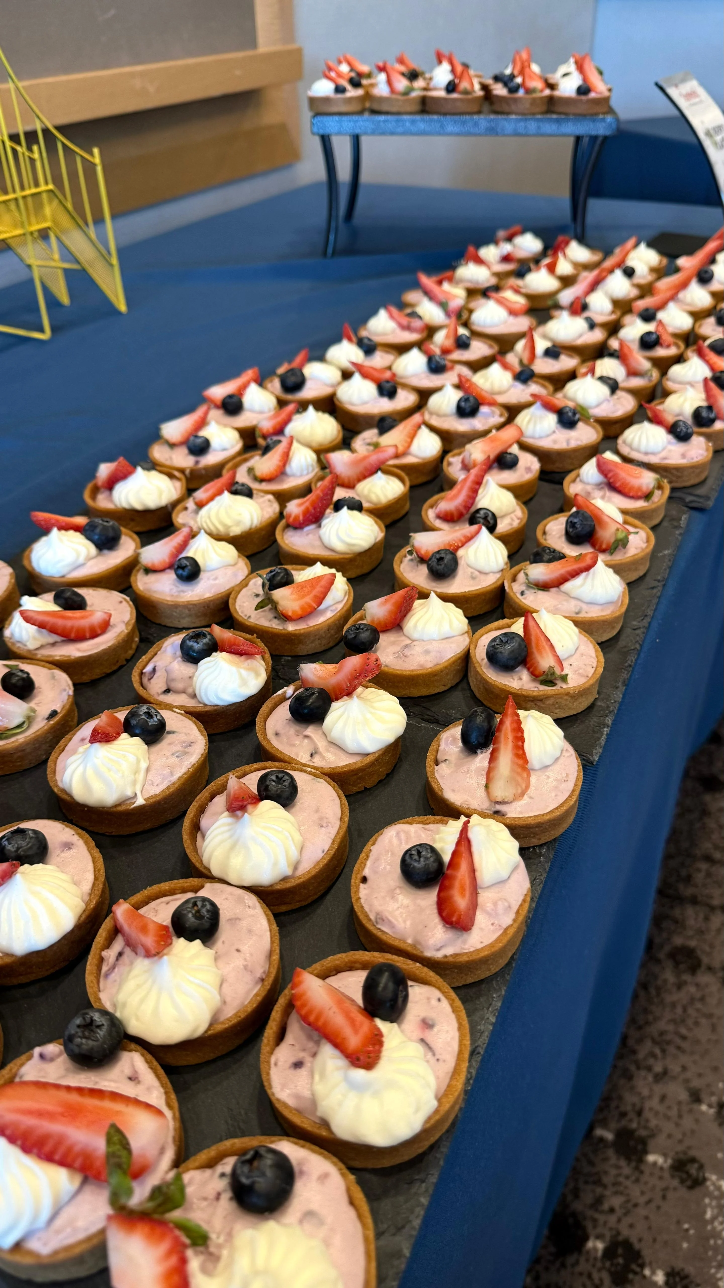 Mini fruit tarts with strawberries and blueberries