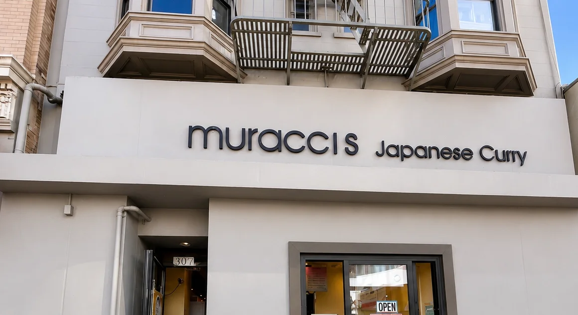 Exterior of Muracci's Japanese Curry restaurant with the main entrance and storefront signage in San Francisco.