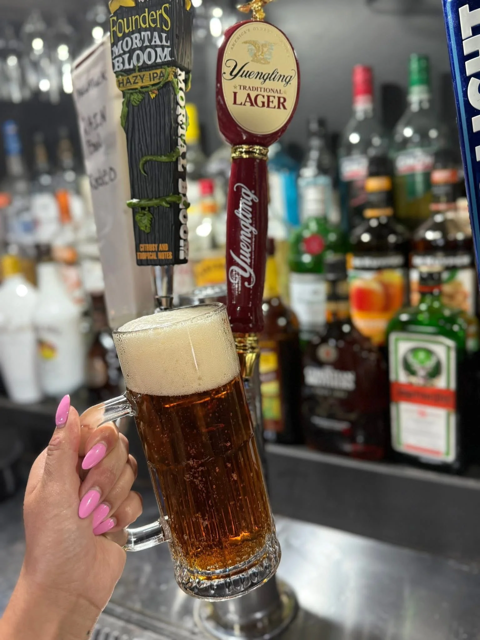 Refreshing beer served at a lively bar counter