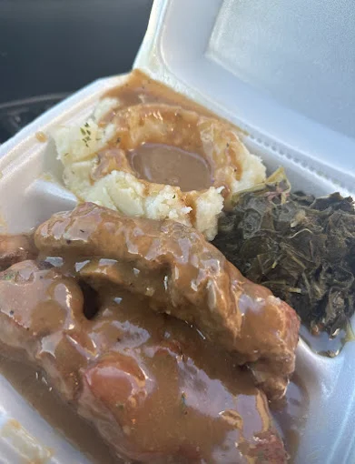 Southern-style smothered pork chops with sides