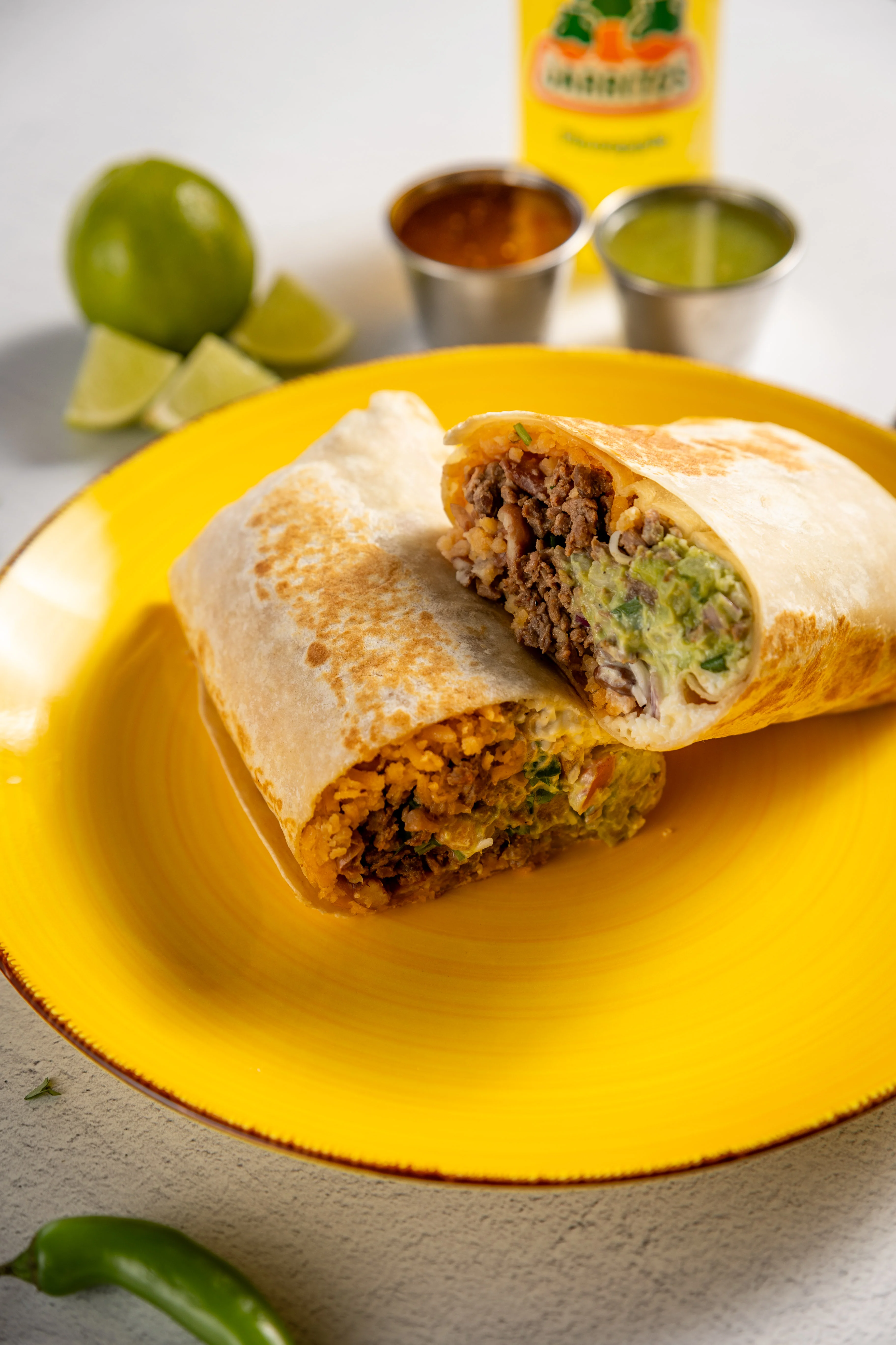 Delicious burrito filled with seasoned beef and guacamole