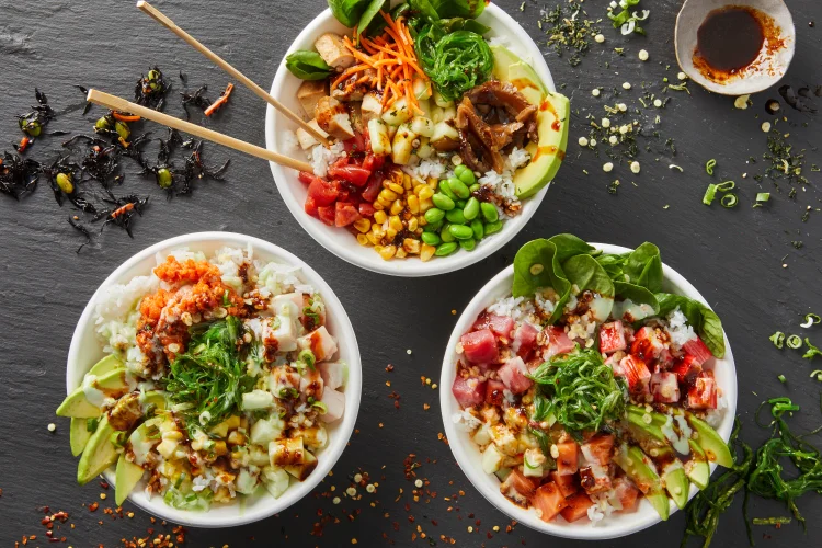 Japanese sushi rolls with a colorful fusion rice bowl