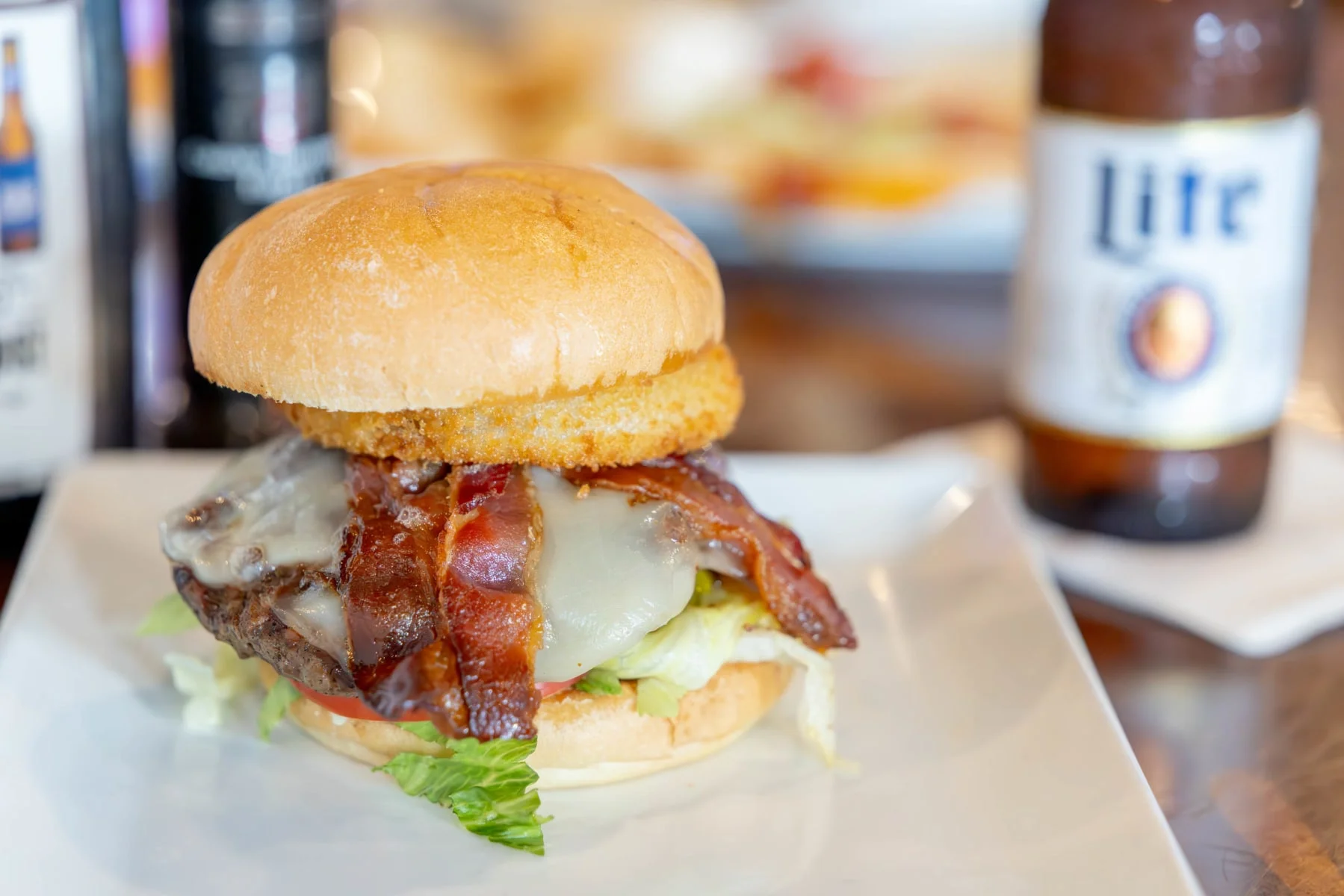 Juicy bacon cheeseburger with crispy onion ring