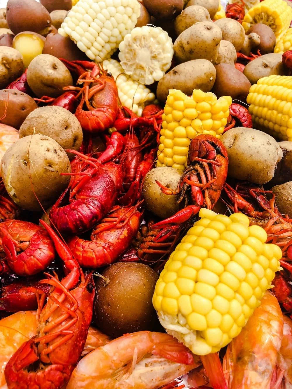 Louisiana crawfish boil with corn and potatoes