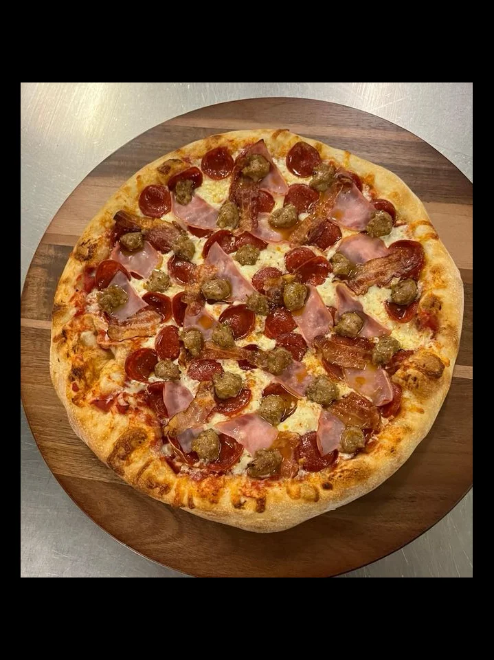 Loaded meat lover's pizza with pepperoni and sausage