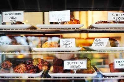 case full of Buckeye Joe's pastries and zucchini bread