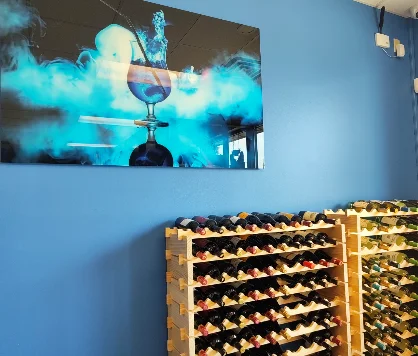 Stylish wine display with modern art in a vibrant restaurant setting