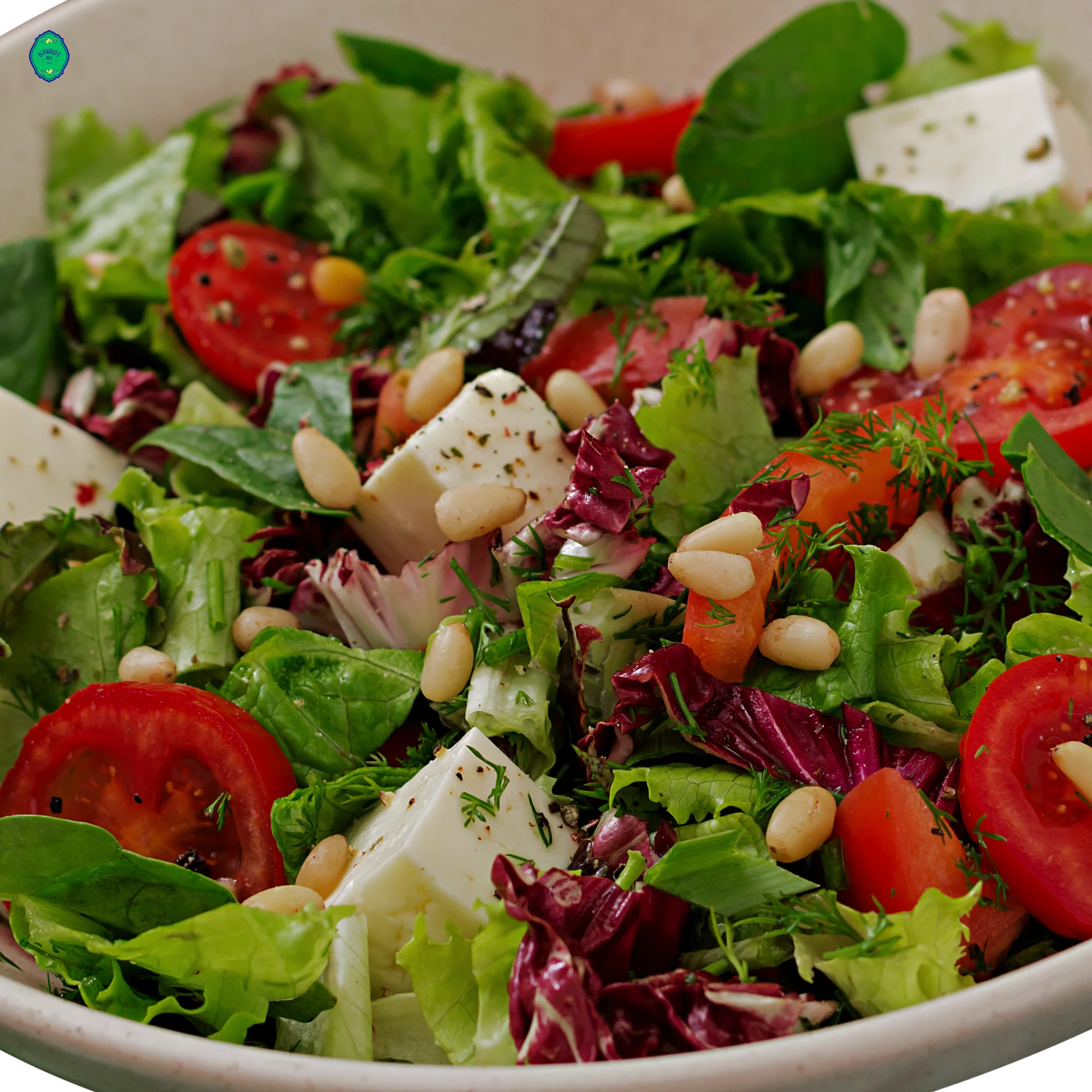 Fresh Mediterranean salad with feta and pine nuts