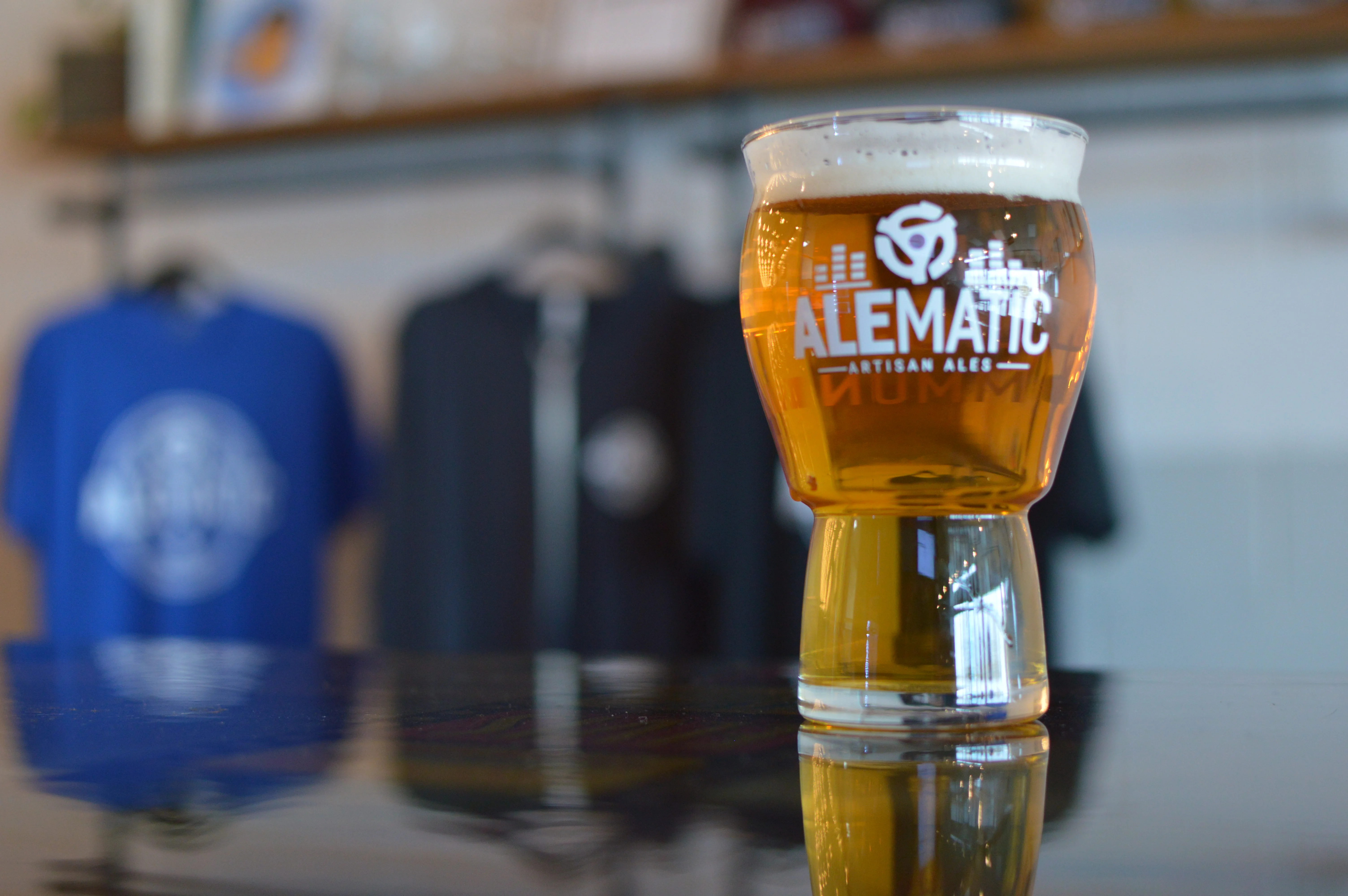 Alematic Artisan Ales’ lager beer sitting on a bartop in Huber Heights, Ohio.