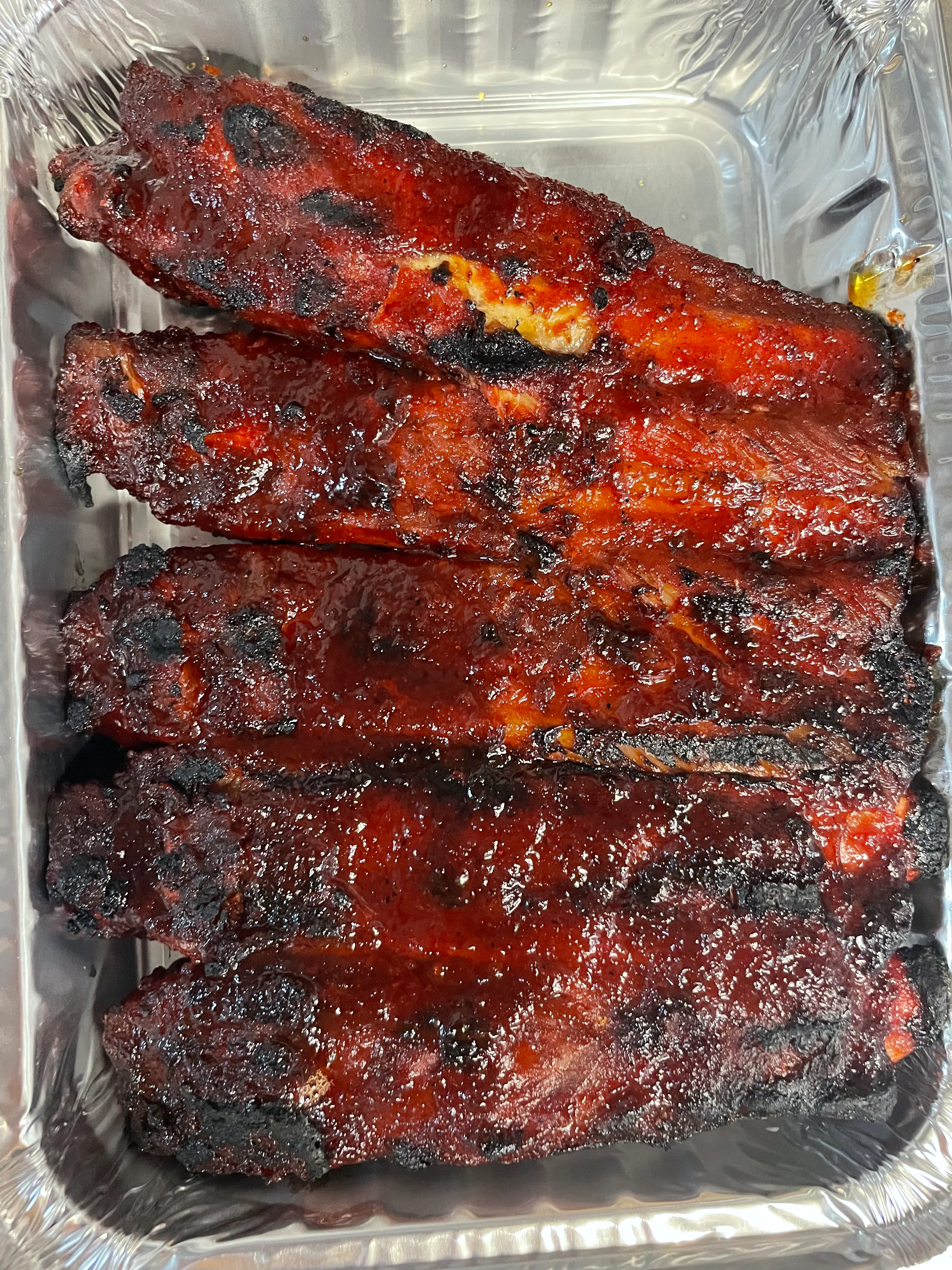 Smoky barbecue ribs glazed with sauce
