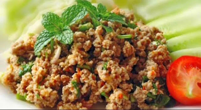 Larb, a dish made of Minced Chicken, Toasted Rice, Spicy Lime Dressing