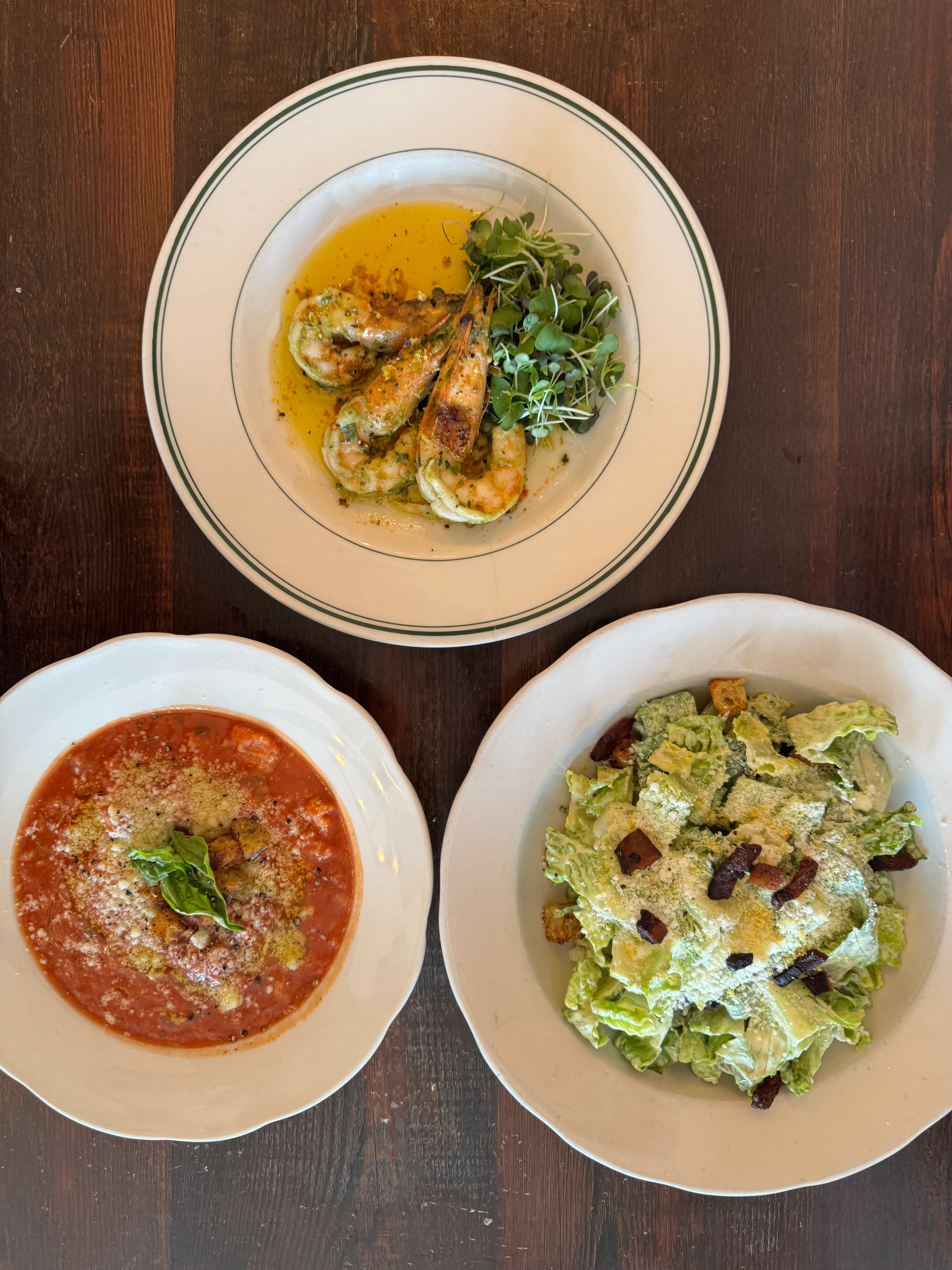 Grilled shrimp with garlic butter sauce, Italian-style tomato soup, Caesar salad