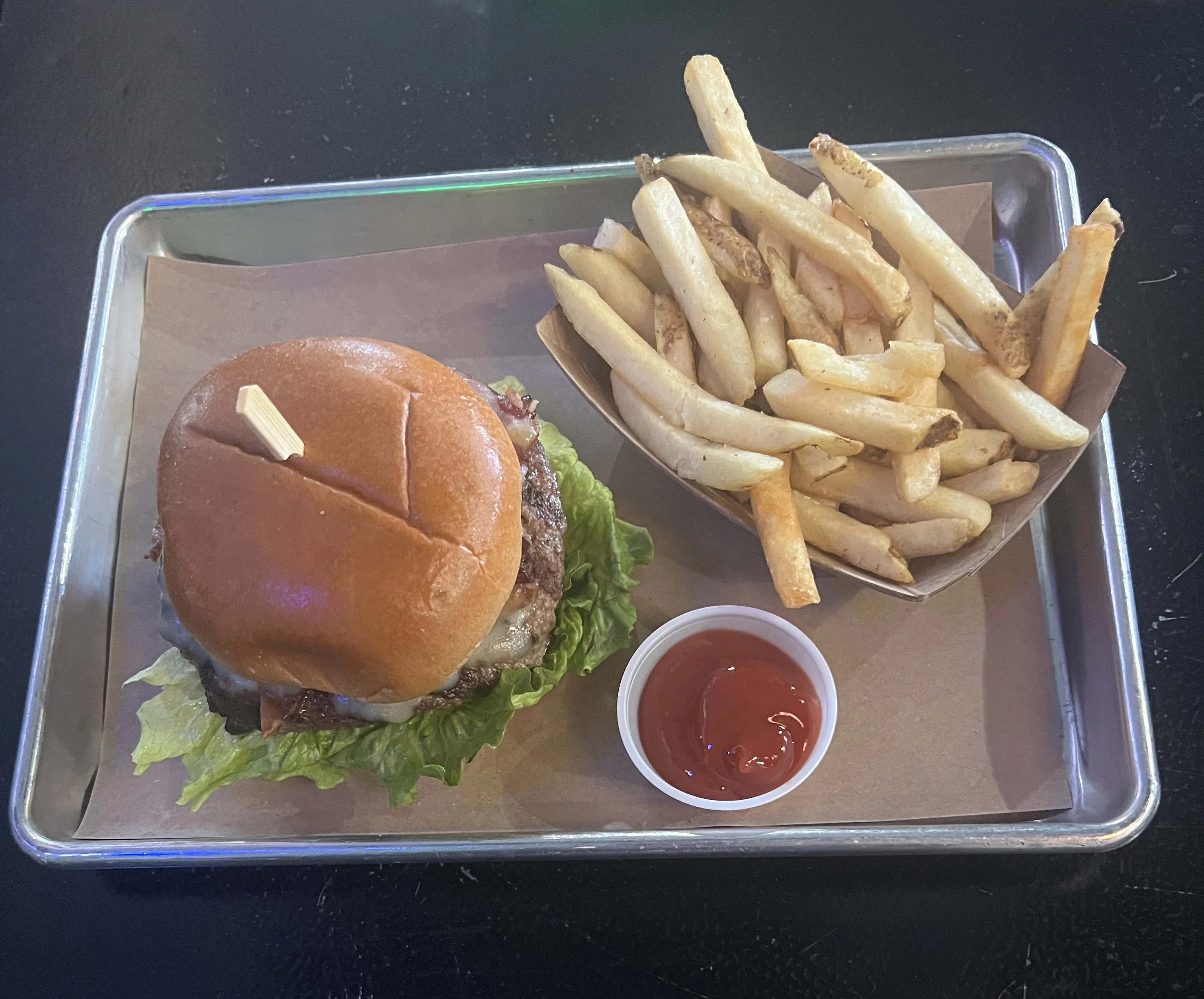 Classic American cheeseburger with fries