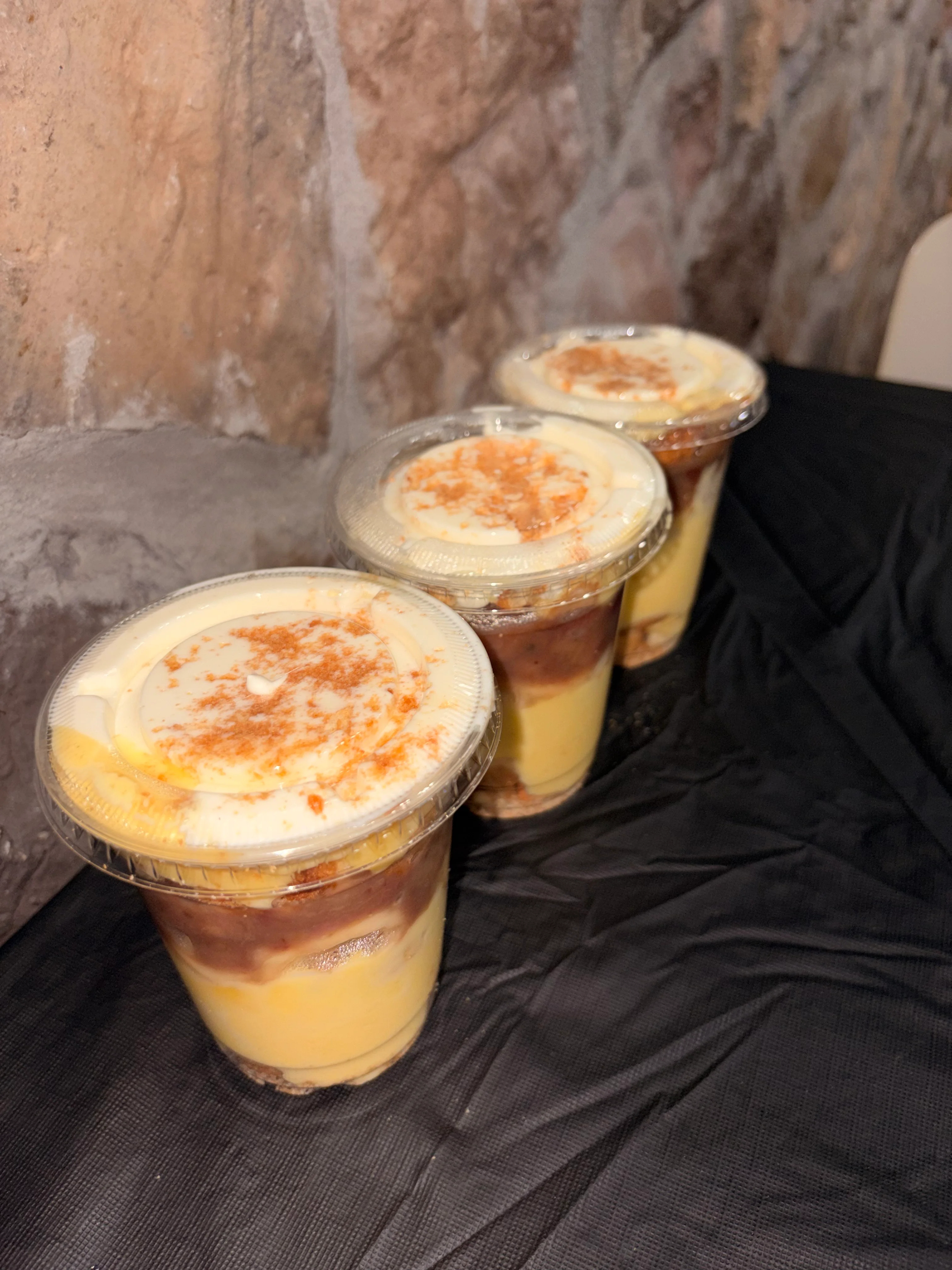 Delicious mango pudding cups with chocolate layers