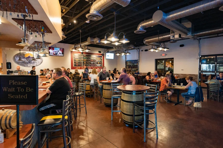 Cozy restaurant interior with patrons enjoying their meals
