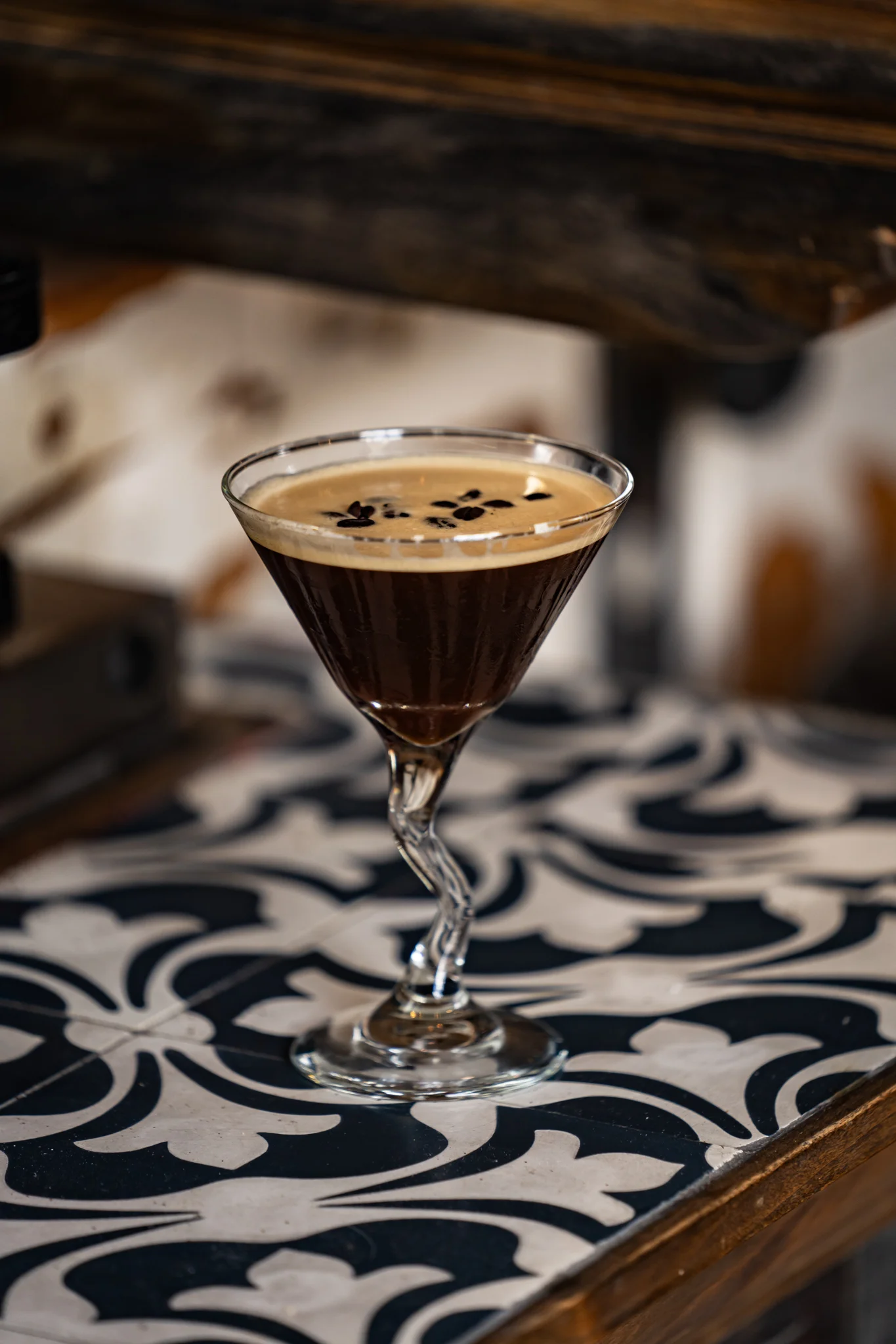 Espresso martini garnished with coffee beans