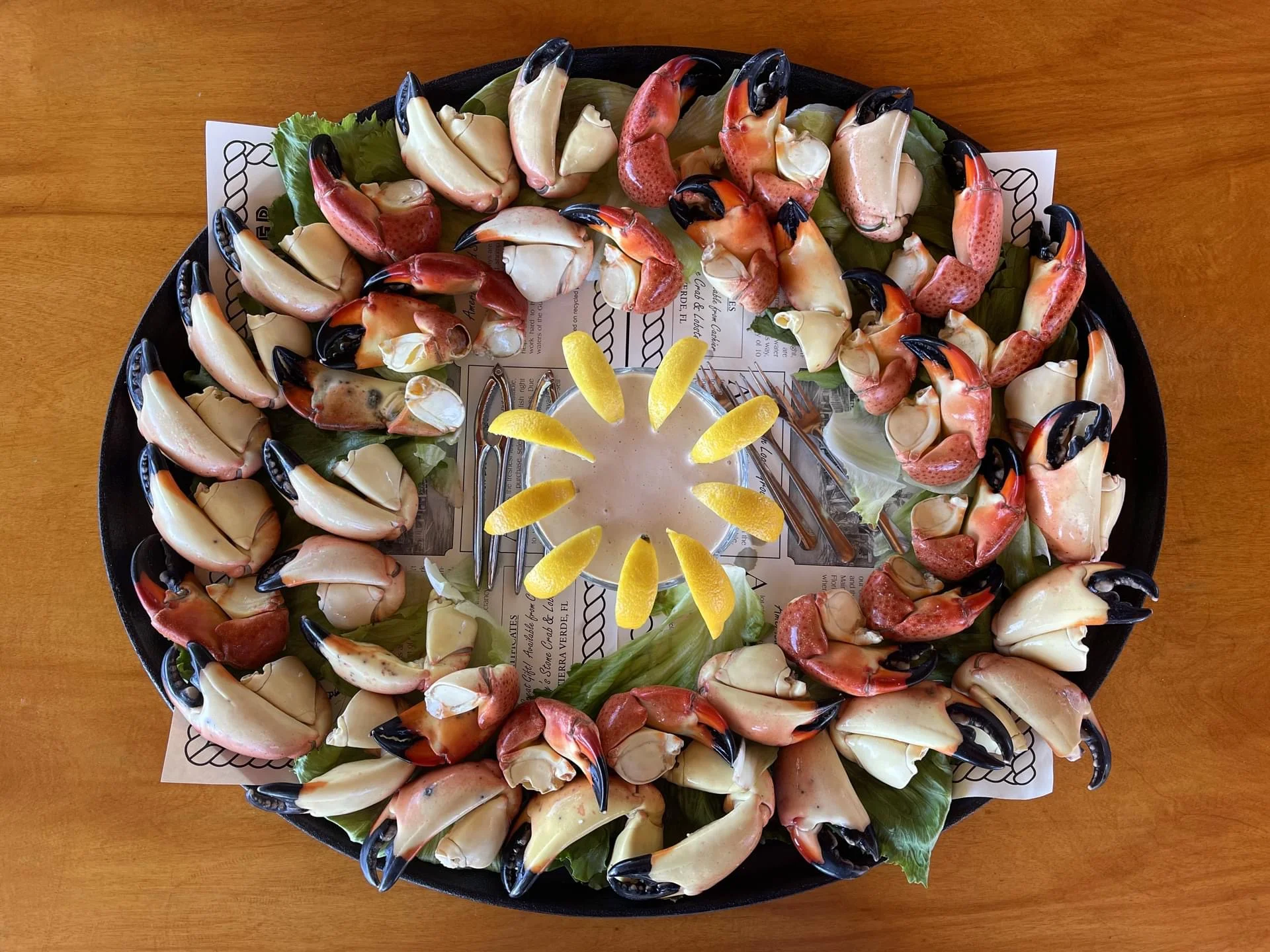 Fresh Florida stone crab claws served on a platter