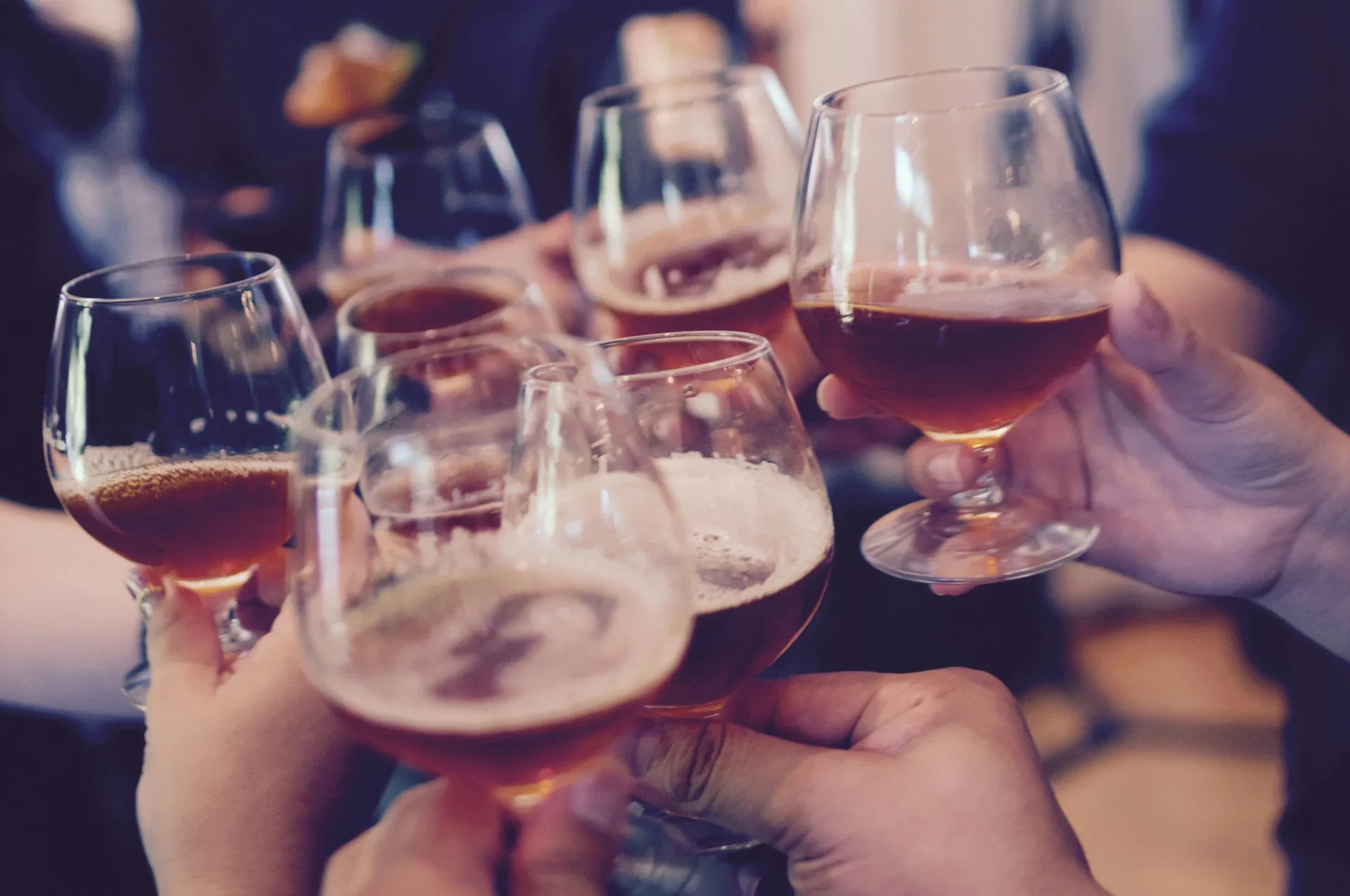 Two glasses raised in a toast, celebrating a joyful moment.