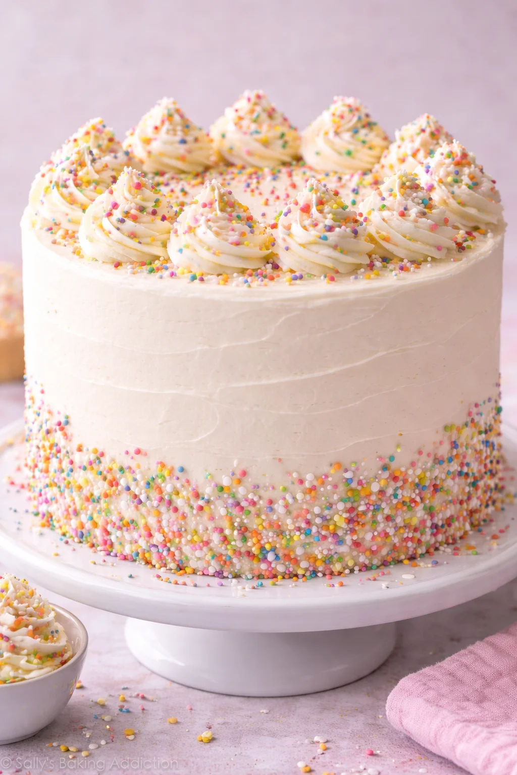 Colorful buttercream celebration cake with vibrant decorations
