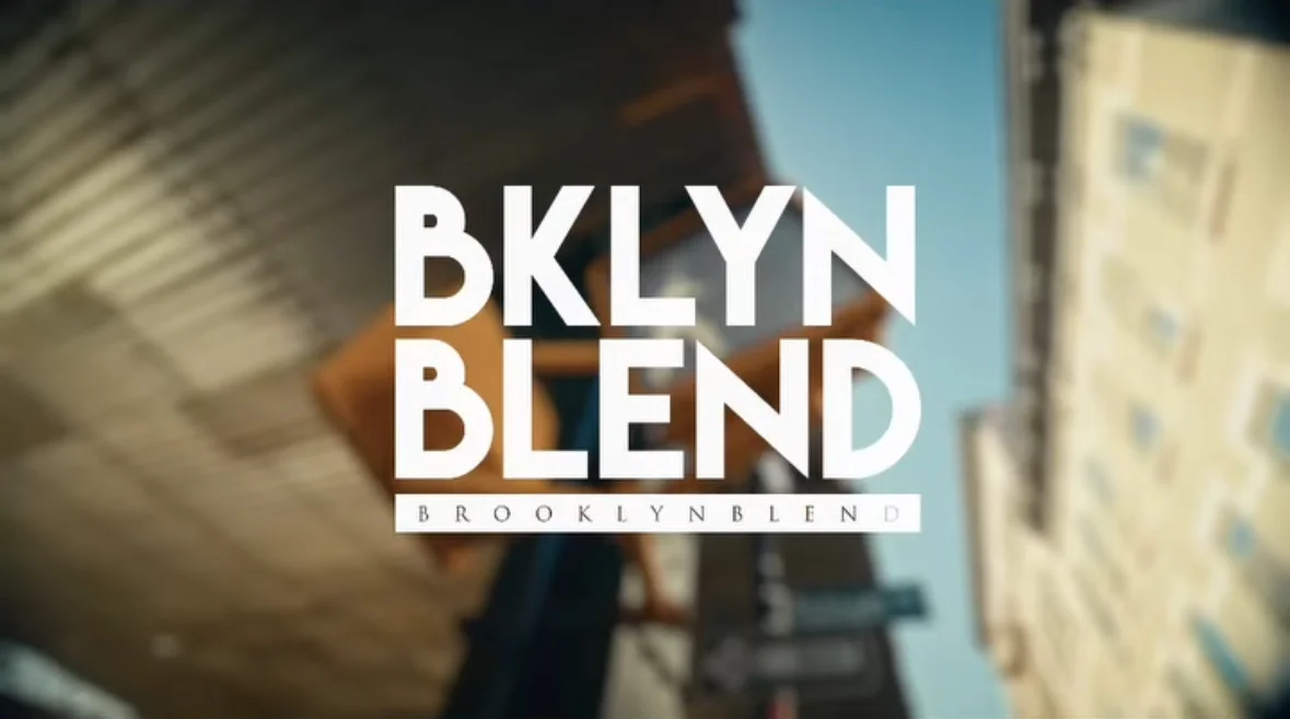 BKLYN Blend logo in white overlayed on blurred image taken in Brooklyn, NY.