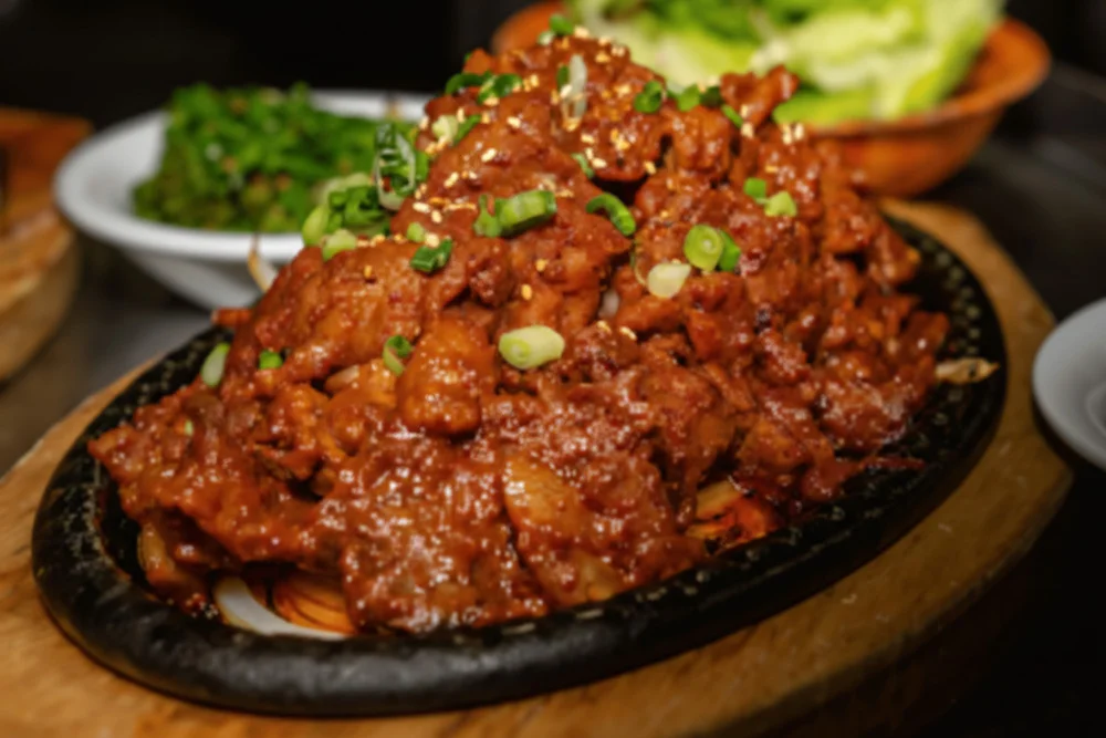 Sizzling Korean bulgogi served on a hot stone plate