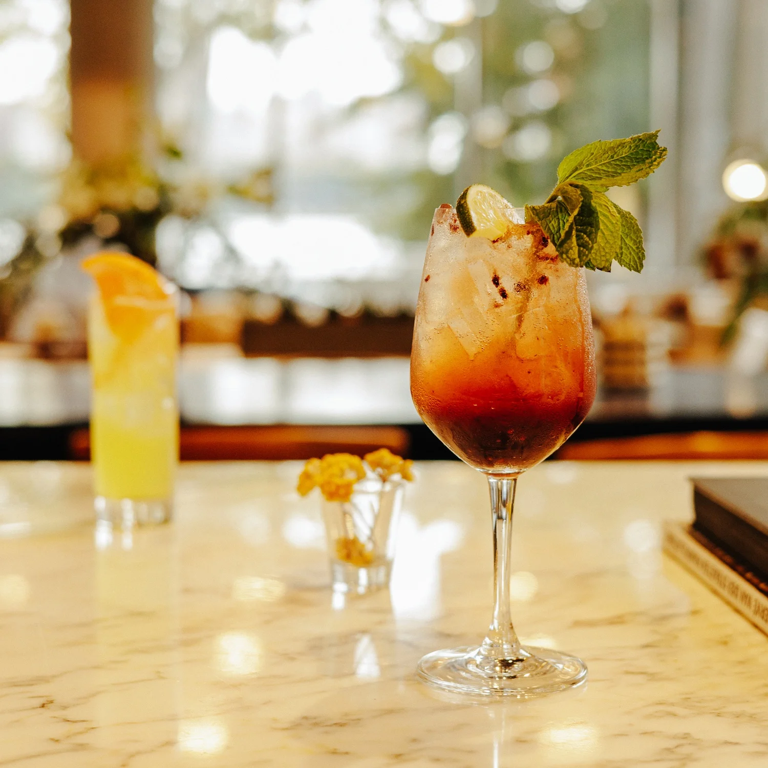 Refreshing cocktail with mint and lime in a stylish glass