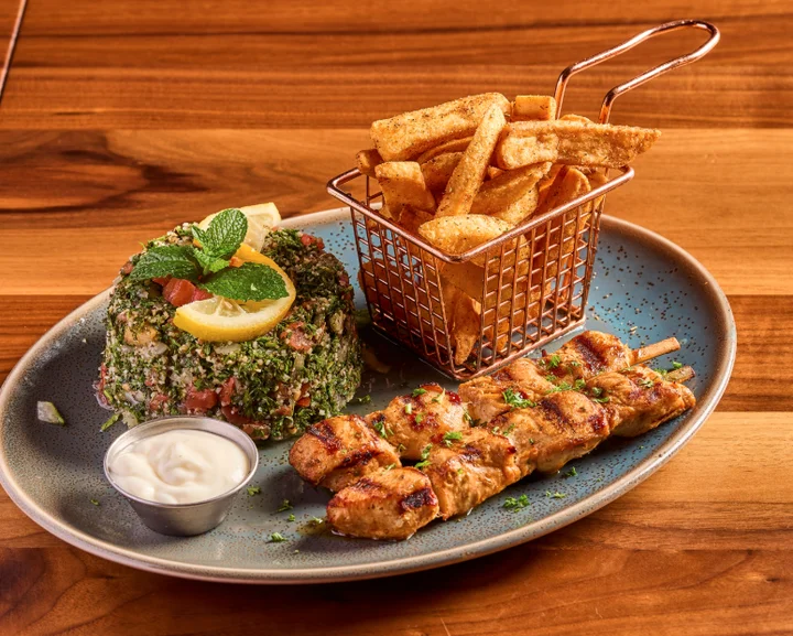 Chicken kebab platter at Sufrat Mediterranean Grill.