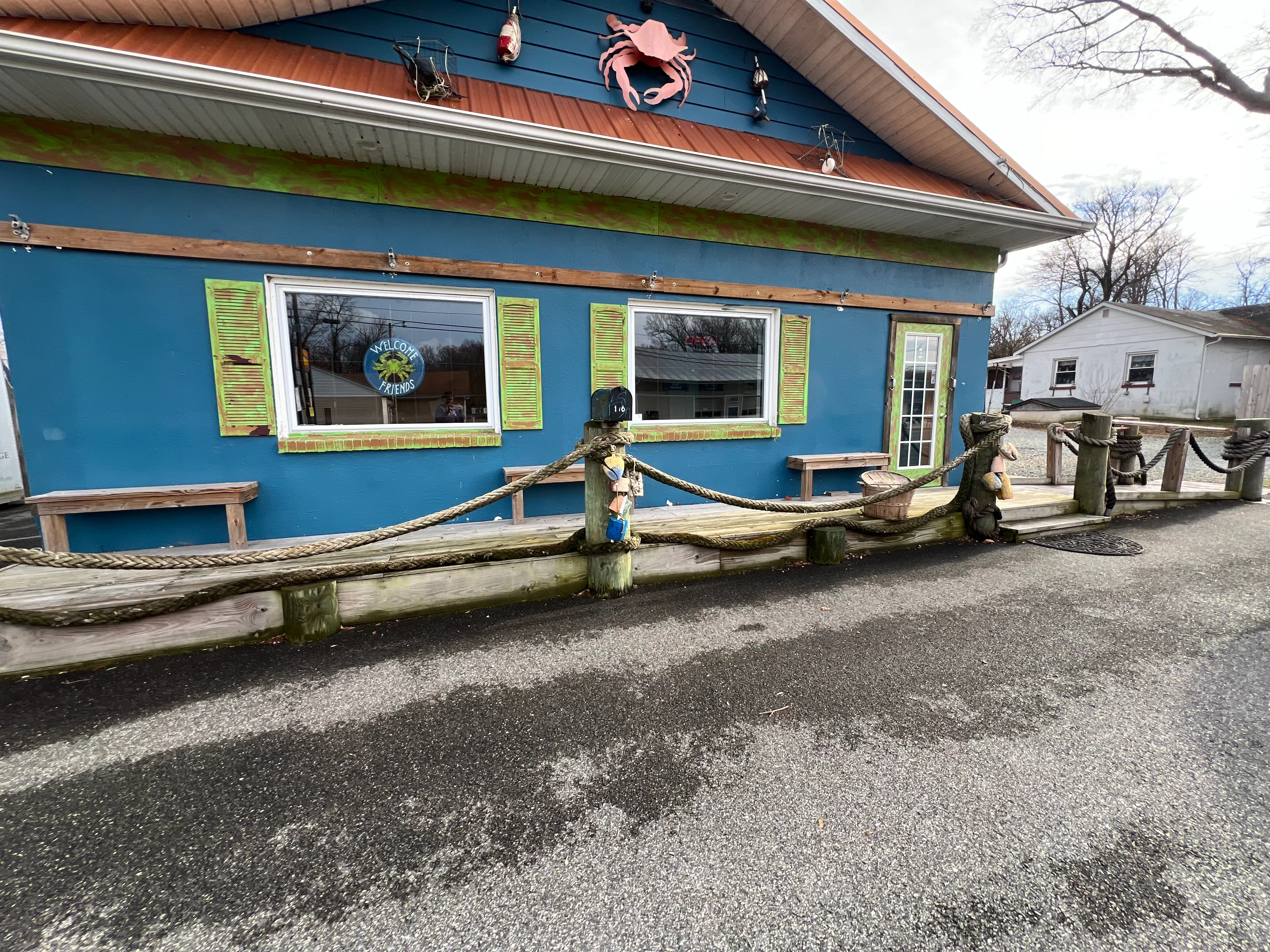 Colorful seafood restaurant exterior with nautical decor