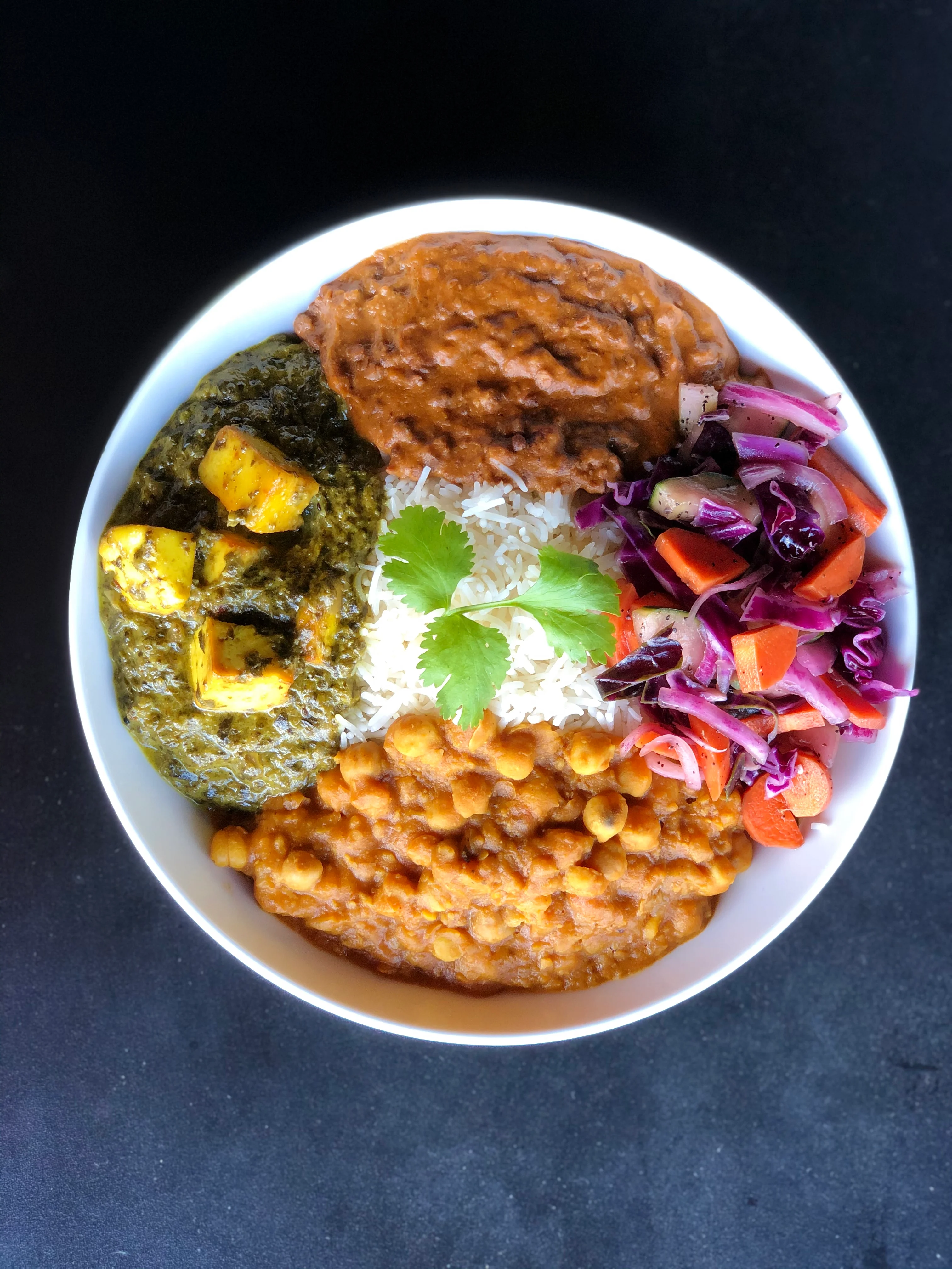 Indian thali with paneer, dal, and rice