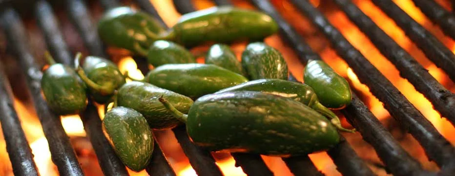 Grilled jalapeños for Mexican cuisine