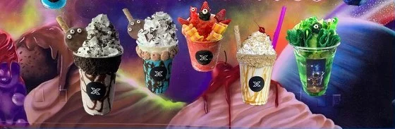 Colorful milkshakes with toppings in a vibrant setting