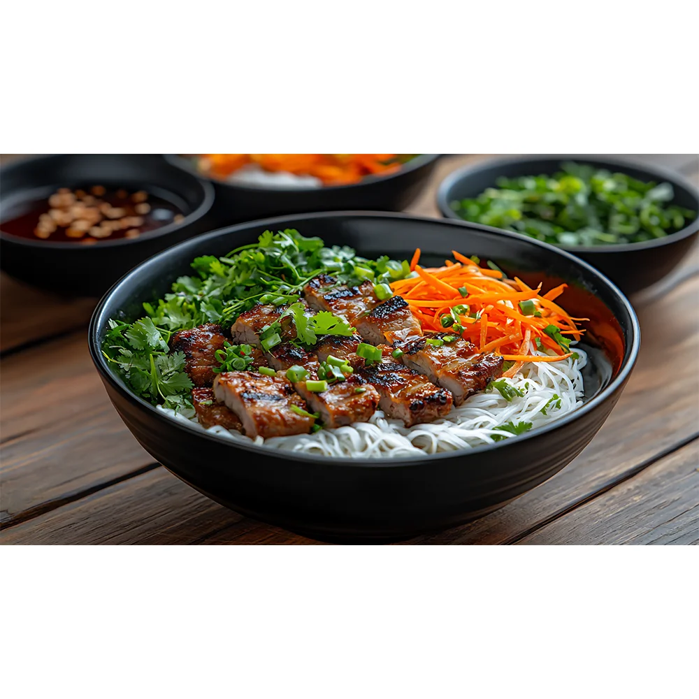 Vietnamese bun thit nuong with grilled pork and fresh herbs