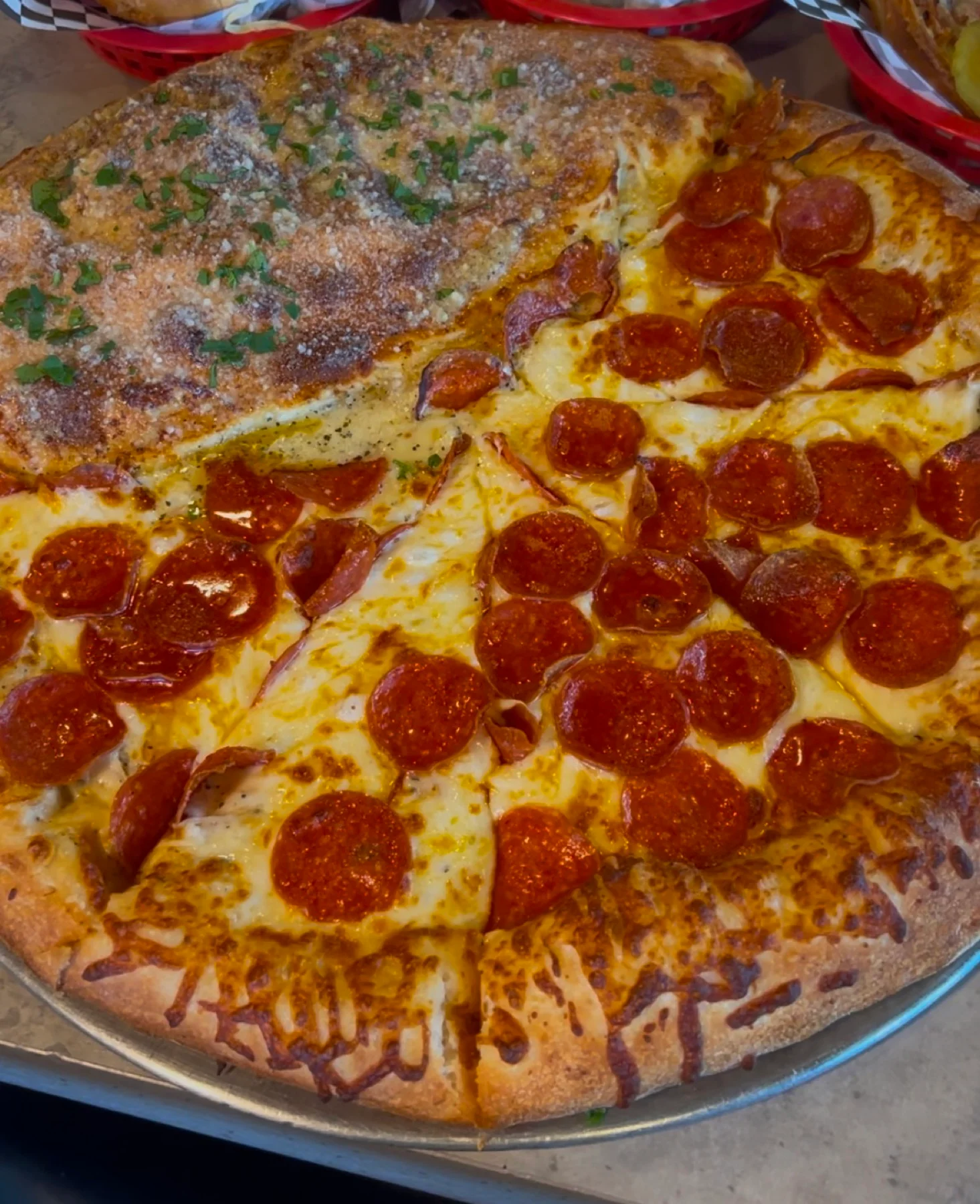 Stadium Pepz Pepzone Deluxe, two-thirds pepperoni pizza and one-third calzone