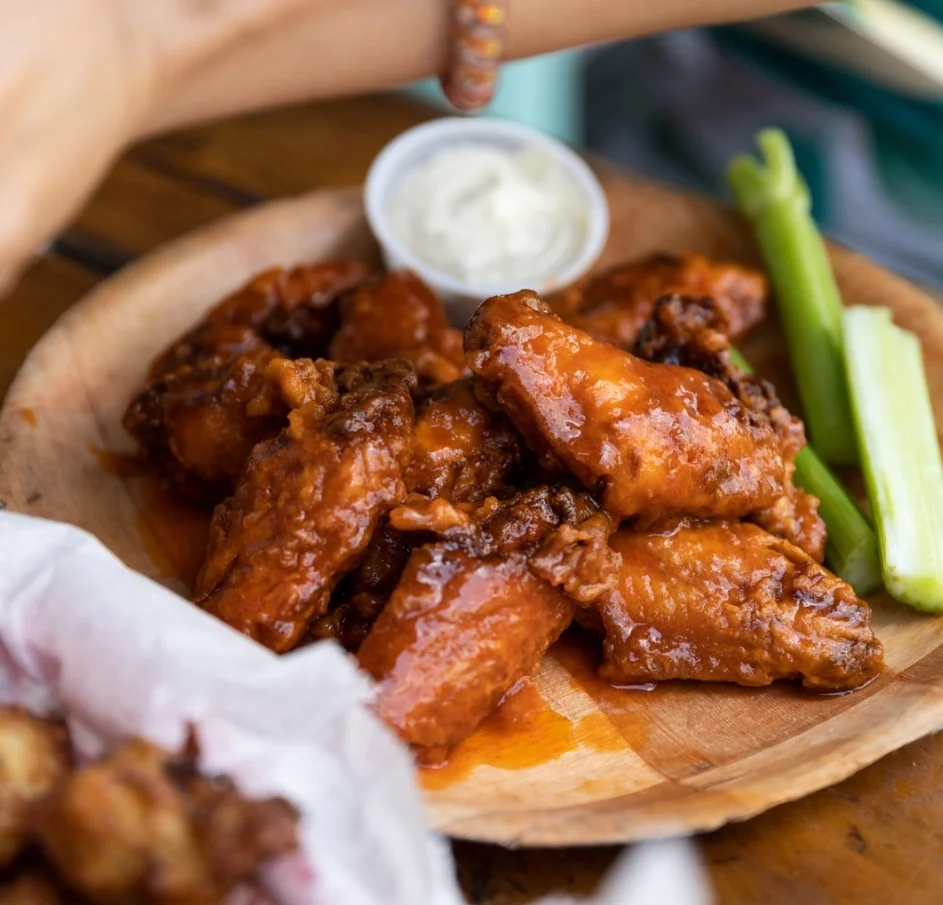 Buffalo chicken wings served with celery sticks and dip at Tarks of Dania in Dania Beach, Florida