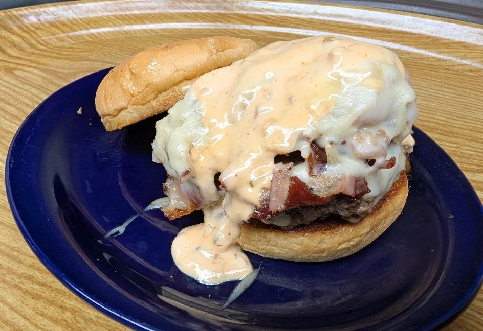 Loaded cheeseburger with special sauce and bacon