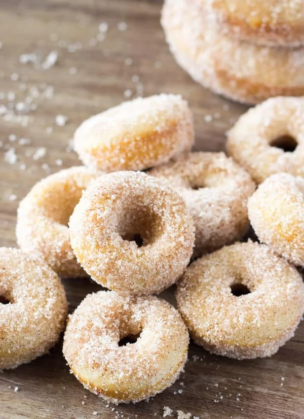 Delicious mini churros drizzled with chocolate sauce