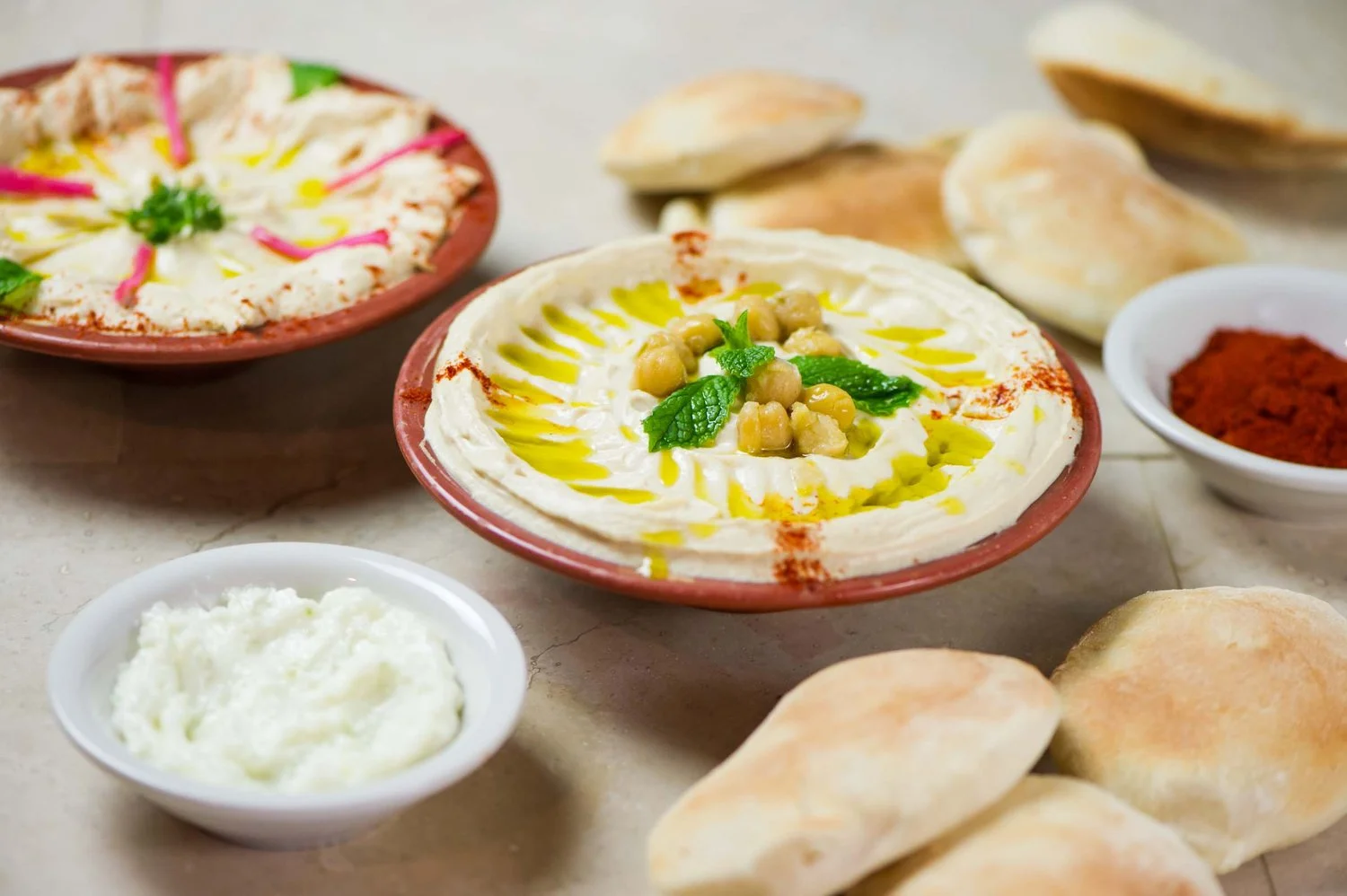 Creamy  hummus plate and pita bread