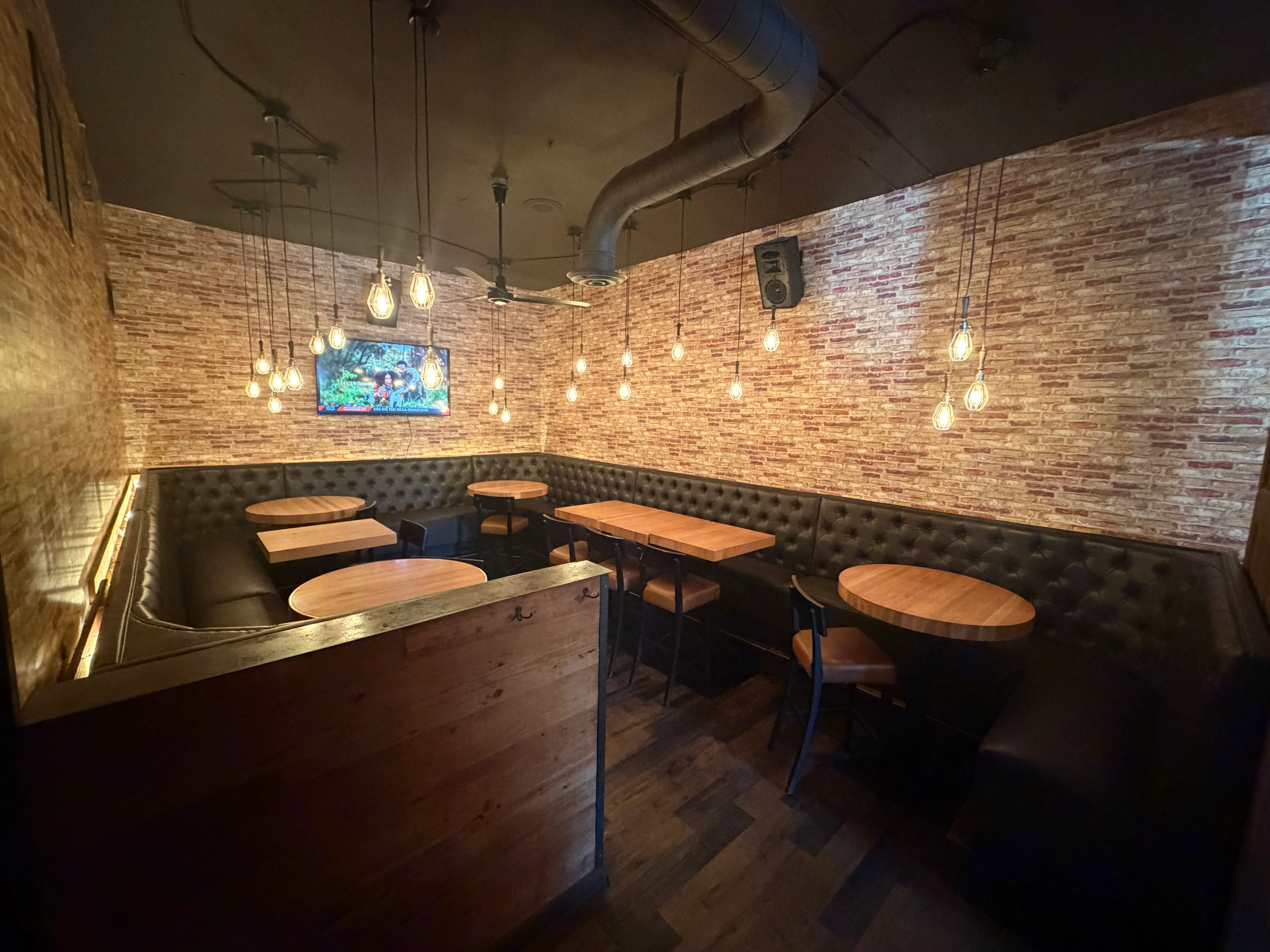 Delicious gourmet burger with fresh toppings on a wooden table