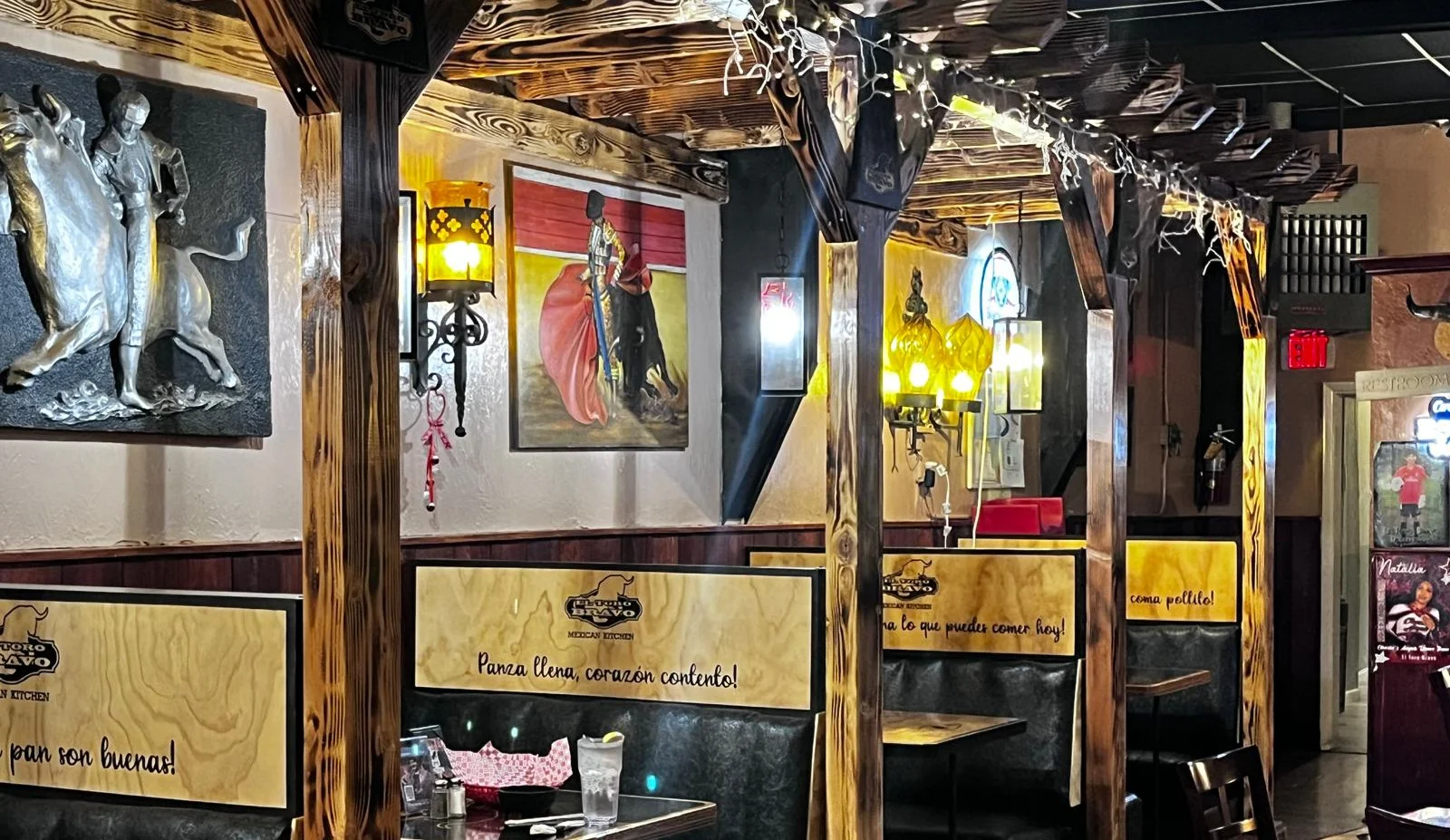 Cozy Mexican restaurant interior with rustic decor and warm lighting
