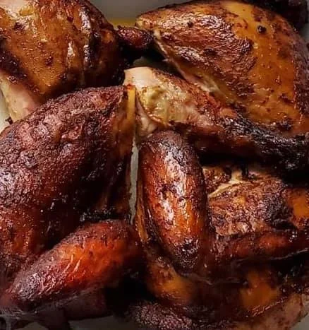 Smoky Jamaican jerk chicken platter with crispy skin